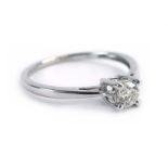 An 18ct white gold ring set brilliant cut diamond in a four claw setting, stone approximately 0.