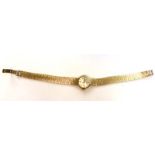 A ladies 9ct yellow gold manual wind wristwatch by Eterna,