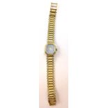 A ladies 9ct yellow gold cased wristwatch,