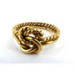 An 18ct yellow gold ring of ropetwist knot design, ring size M, 3.