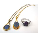 A parcel of opal set jewellery comprising two necklaces and a ring (3)