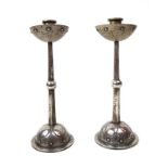Hugo Levin for WMF, a pair of base metal candlesticks,