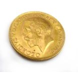 A sovereign dated 1928,