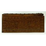 An early 20th century box carved in the Chinese manner with dragons and leaves, w.