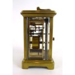 A late 19th century French carriage timepiece in a brass and five-glass case, h.
