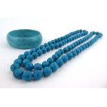 A continuous turquoise bead necklace, l. 121 cm, beads measure d. 1.