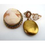 A yellow metal mounted cameo brooch of oval form depicting a classical female head and shoulders, l.