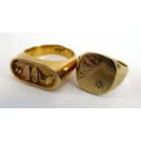 An Egyptian yellow metal ring with hieroglyphic decoration, 4.
