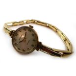 A ladies 9ct yellow gold quartz wristwatch by de Montford,