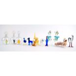 A mixed group of Murano and Bimini coloured glass ornaments including deer, elephants and pheasants,