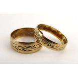 Two 9ct yellow gold wedding bands, each with laurel wreath type engraving, overall 4.