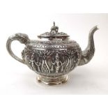 An Anglo-Indian three piece metalware tea service of globular form,