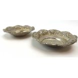 A pair of early 20th century stamped metalware dishes of flowerhead form, stamped '800', d.