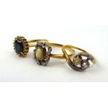 A yellow metal ring set old cut diamond and pearl in a crossover setting, ring size N,