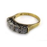 An 18ct yellow gold five stone diamond ring, stones approximately 0.