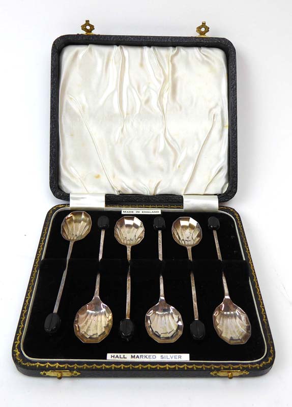 A cased set of six silver bean end coffee spoons in the Art Deco manner,