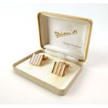 A pair of gilt metal cufflink's of rectangular form