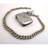 A silver Albert watch chain suspending a silver vesta case, various dates and makers, 1.