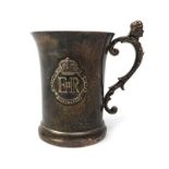 A silver tankard commemorating Queen Elizabeth II's coronation, with monarchs head c-scroll handle,