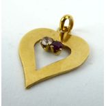 A yellow metal pendant of openwork heart shaped form set red and clear paste, w. 1.9 cm, 2.
