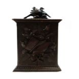 A 19th century carved oak collectors cabinet,