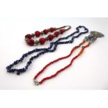 Two American Indian-type beaded necklaces and a lapis lazuli bead necklace (3)