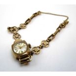 A ladies 9ct yellow gold wristwatch by Avia,
