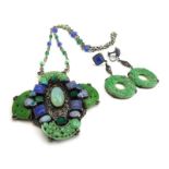 In the manner of Amy Sandheim, an Arts & Crafts metalware necklace set purple,