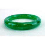 A green jade bangle, internal d. 6.