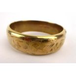 A 9ct yellow gold florally engraved bracelet, internal w. 6.1 cm, 29.