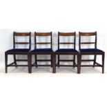 A set of four early 19th century mahogany and brass inlaid dining chairs with rope-twist backs