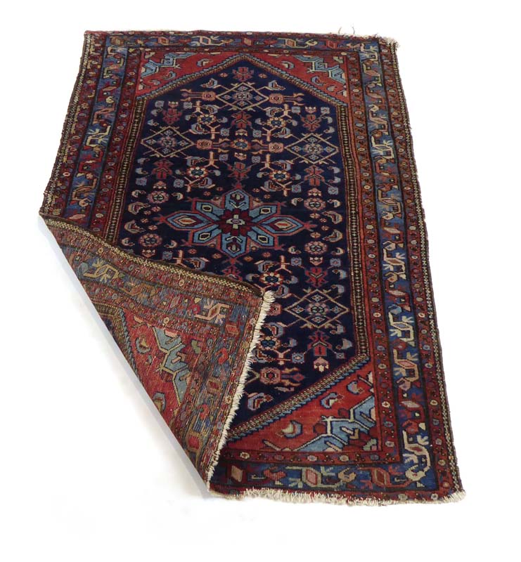 A group of six late 19th century and 20th century rugs including three with Heriz-type patterns and - Image 3 of 3