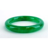 A green jade bangle, internal d. 6.