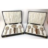 Two cased six piece silver mounted dressing table sets, B&Co.