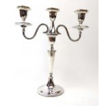A silver three branch candelabrum of canted vase shaped form, maker R&B, Sheffield 1973, h. 29.
