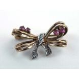 A 9ct yellow gold brooch of bow design set small diamonds and rubies, w. 2.5 cm, 3.