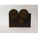 A 19th century partial double clock movement with twin dials operating in opposing directions