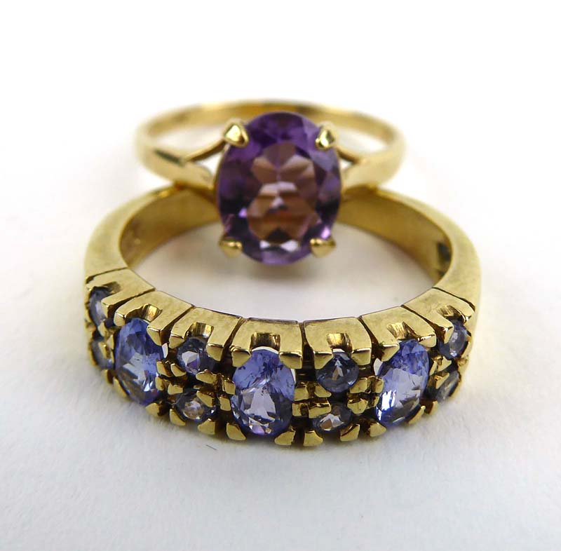 A 9ct yellow gold ring set amethyst in a four claw setting, - Image 2 of 2