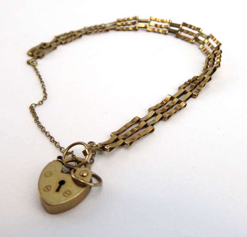 A 9ct yellow gold three bar gatelink bracelet with heart shaped padlock clasp, 3. - Image 2 of 2