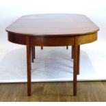 A George III mahogany dining table comprising of two D-ends,