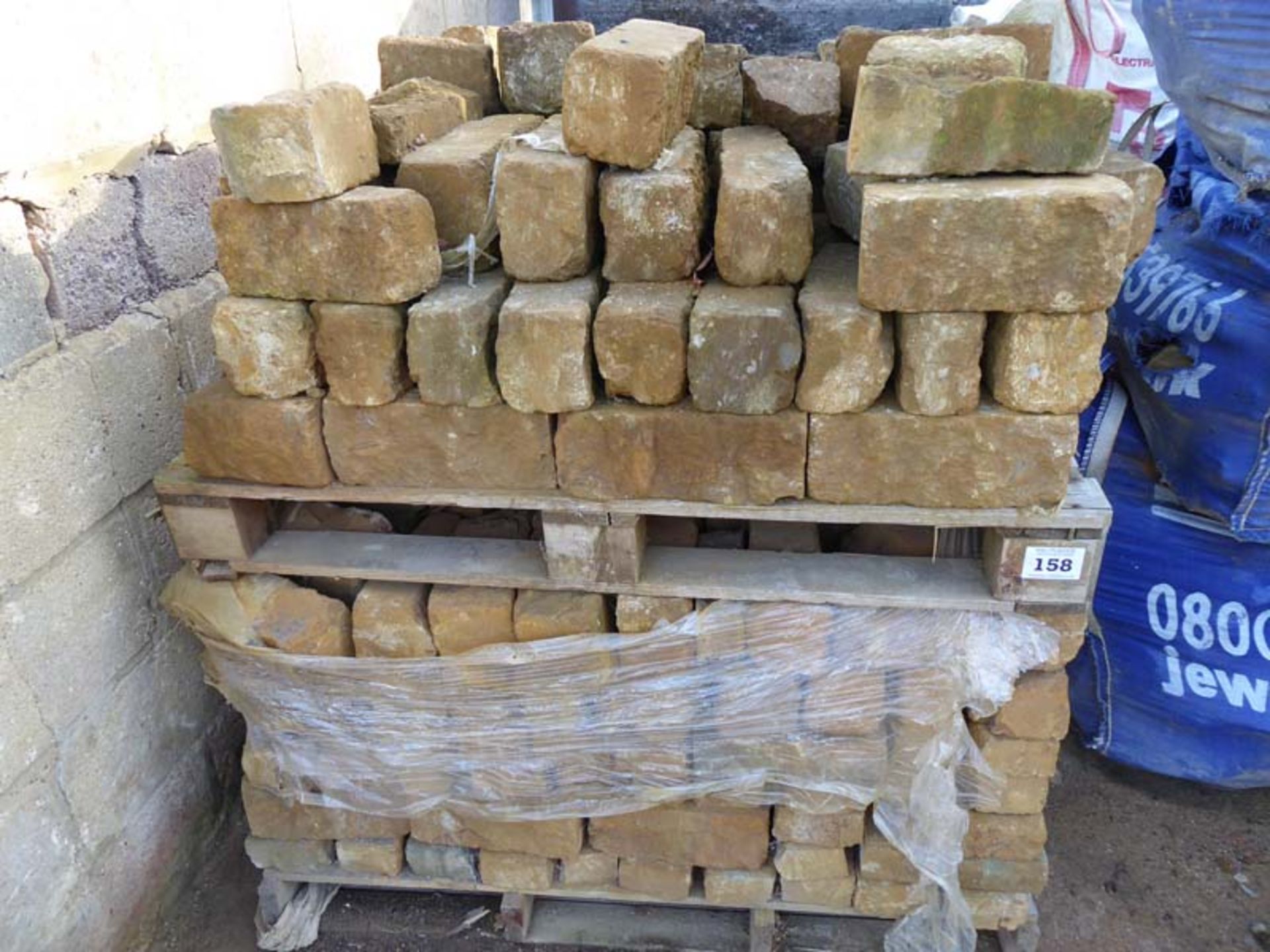 3 stillages and 4 builders bags of ironstone walling