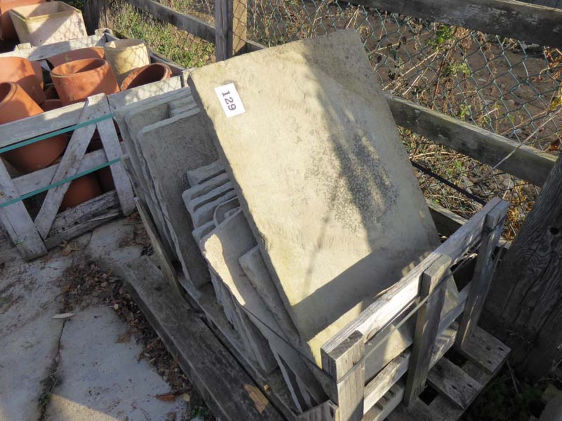 Stillage of concrete York stone style paving slabs