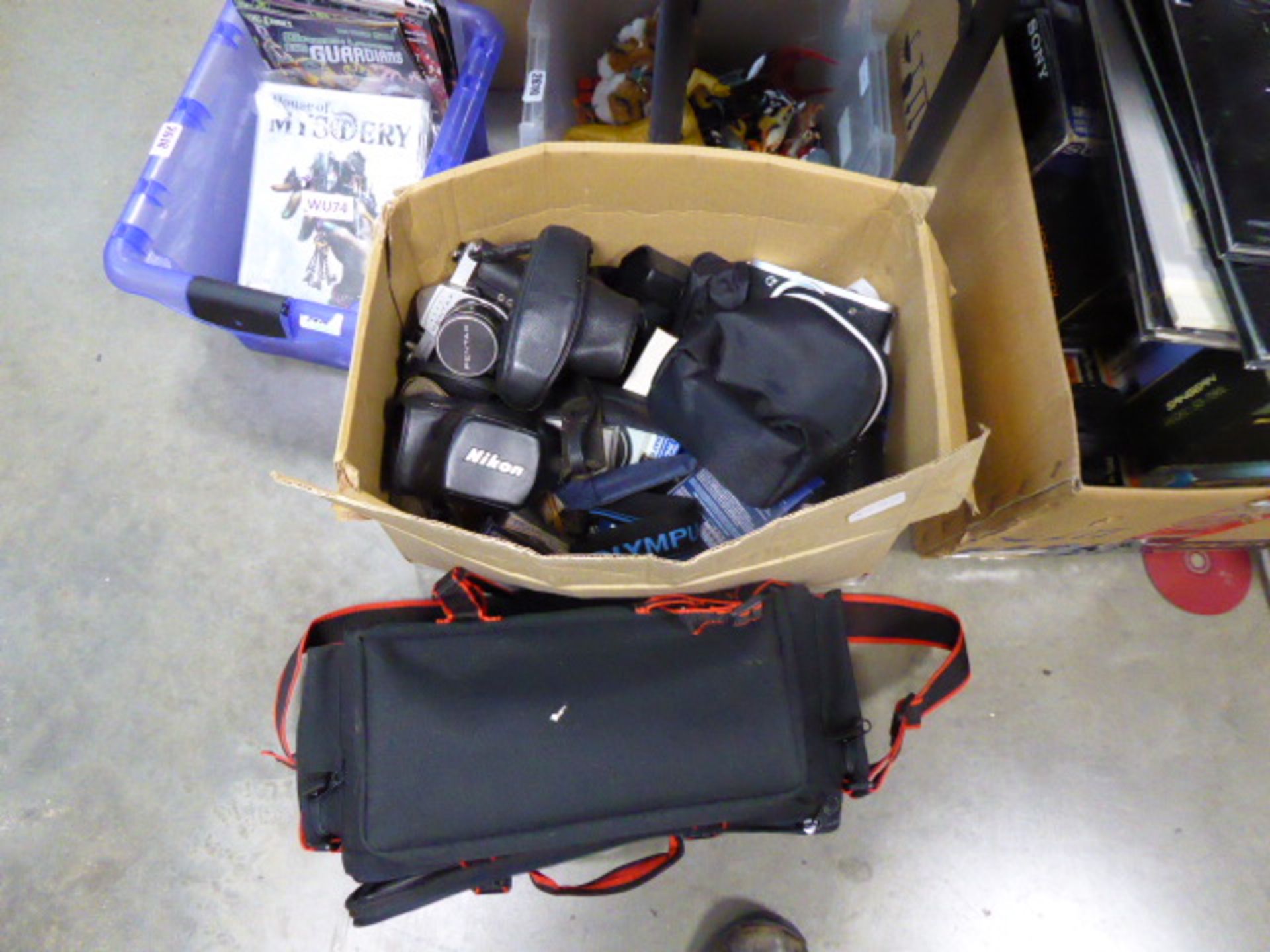 Box containing assorted photo equipment inc. Miranda cameras bodies, Nikon camera cases, Pentax