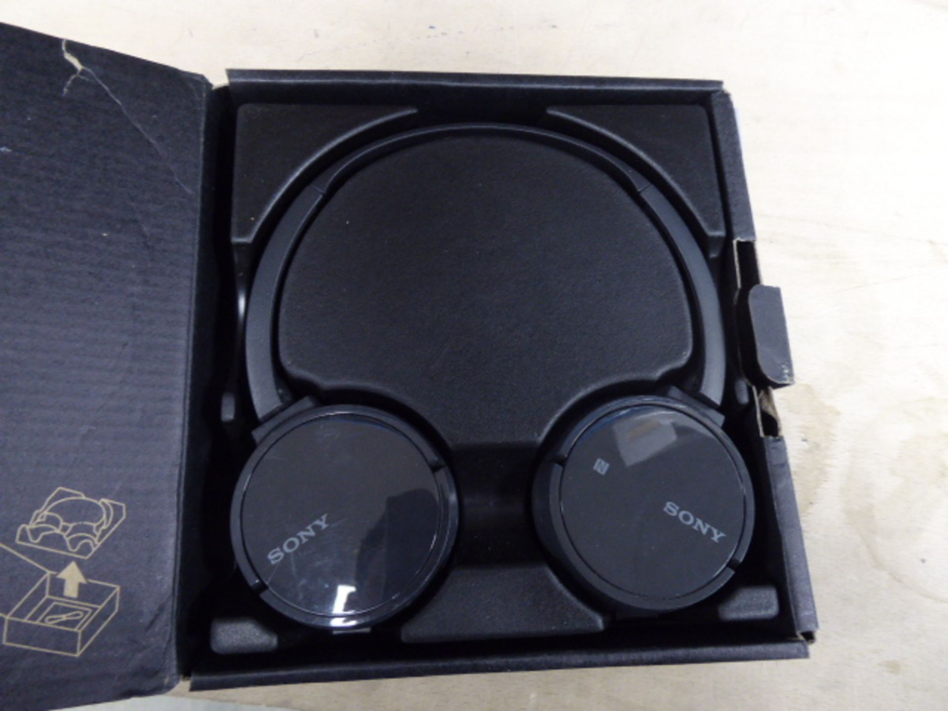 Boxed pair of Sony headphones (a/f)