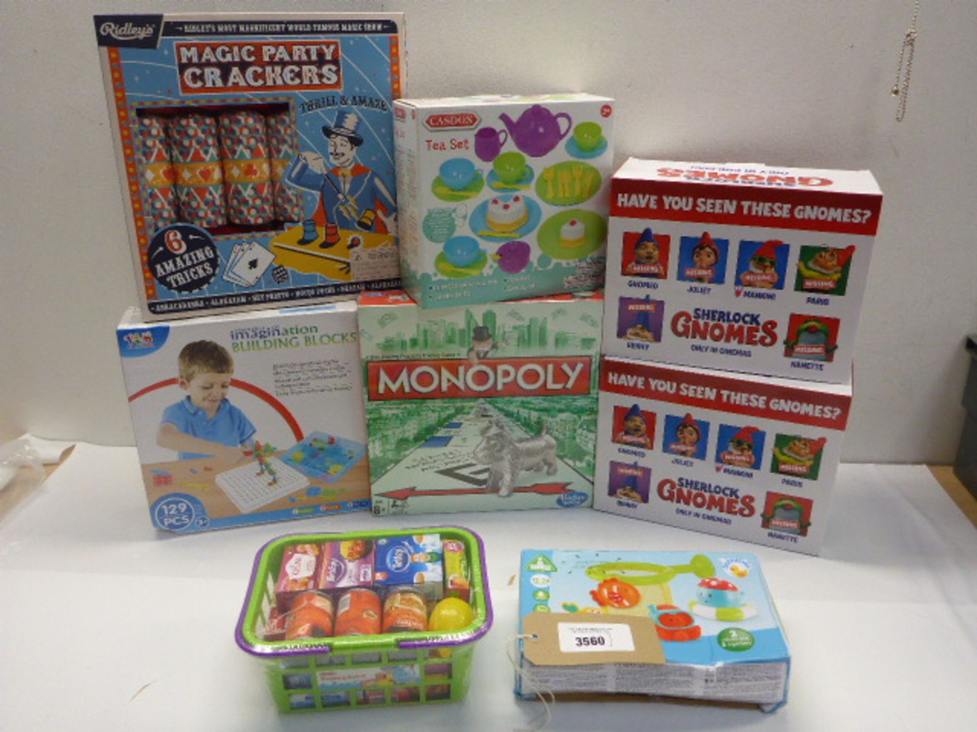 8 boxed games including Monopoly, Sherlock Gnomes, Tea set, building blocks etc