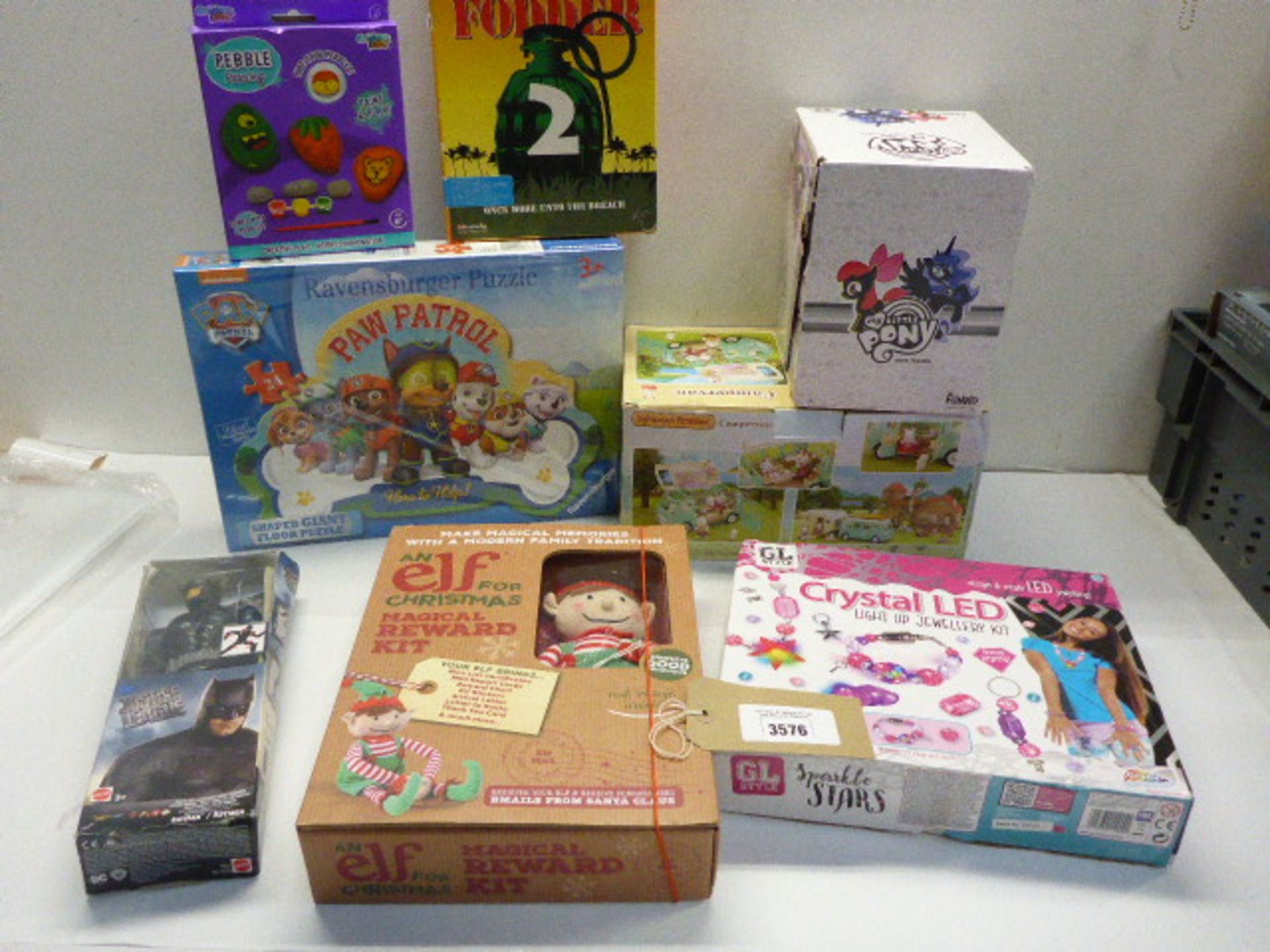 8 boxed games including Paw Patrol puzzle, My Little Pony figures, Elf Reward kit, Sparkle stars etc