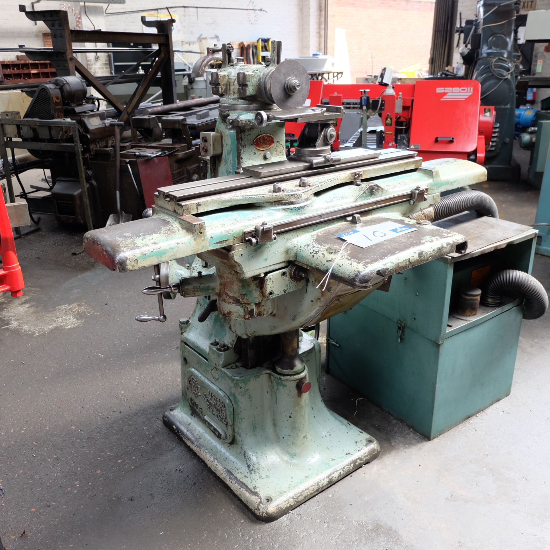 An Alfred H Schutte WU3 Tool and Cutter Grinder with dust extraction unit.