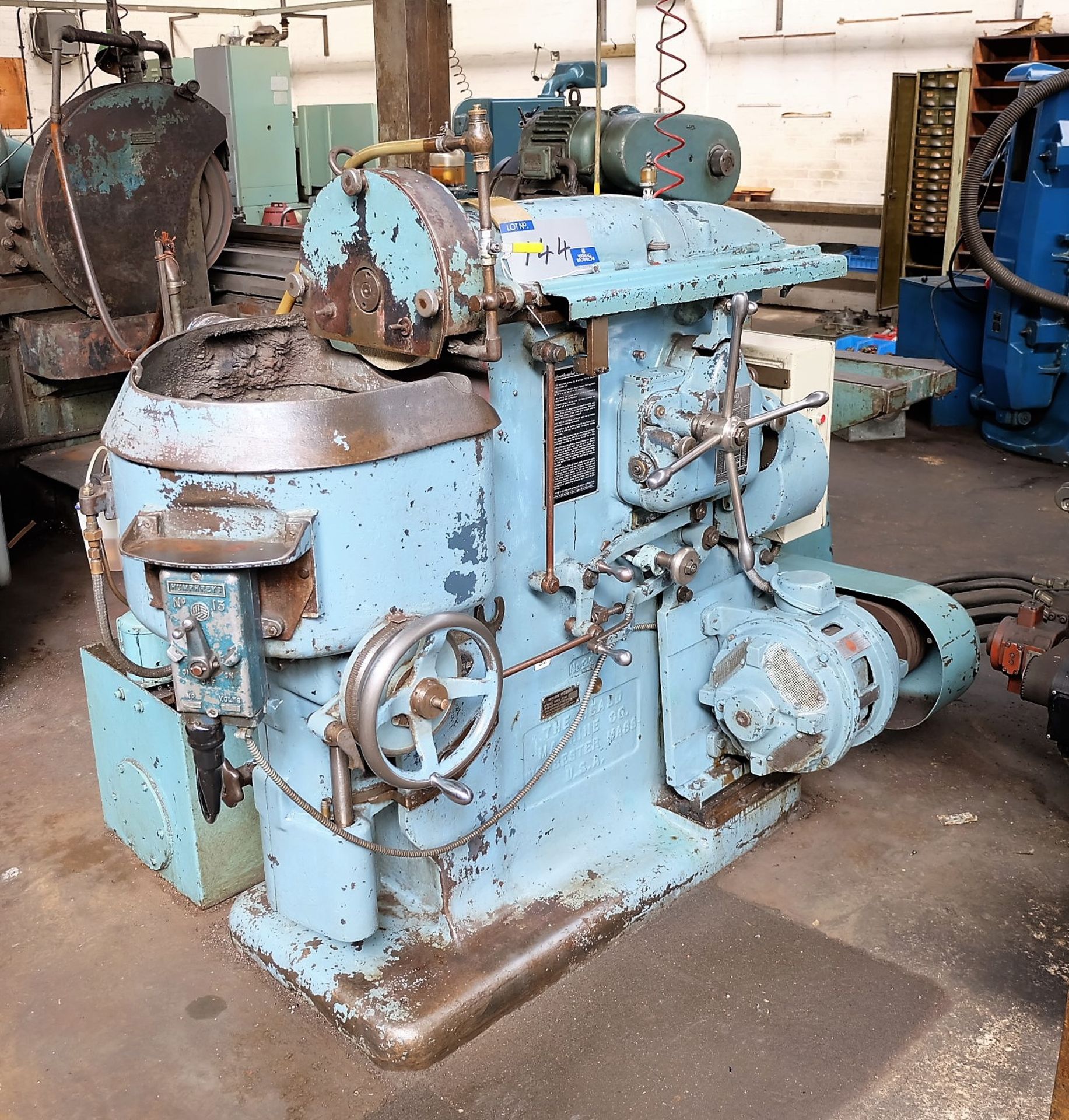 A Heald No.22 Rotary Ring Grinder, 13.5in magnetic chuck with coolant tank.