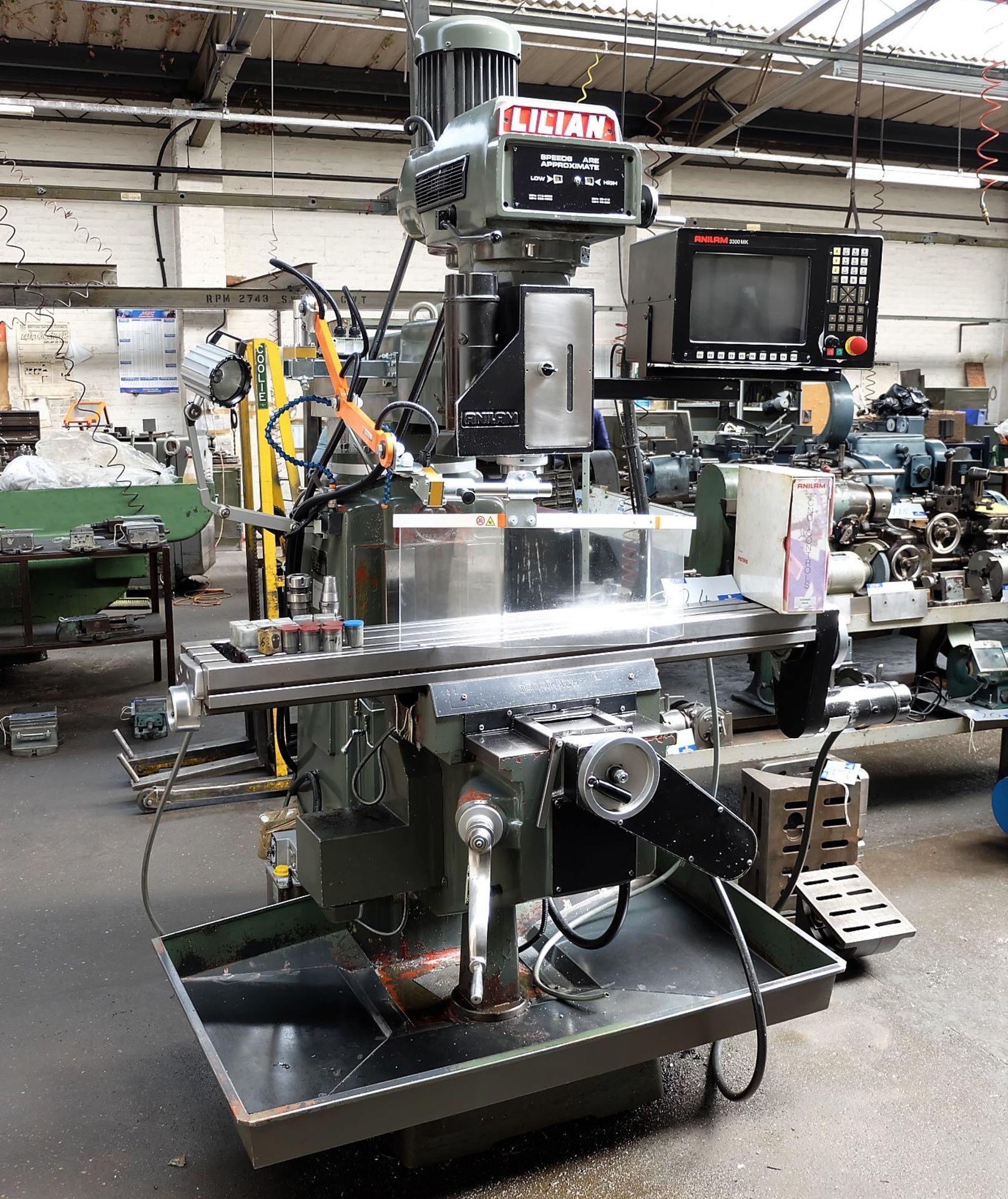 A LILIAN Model 5VH CNC Vertical Turret Head Milling Machine No.9865 (2000), 54in x 10in table