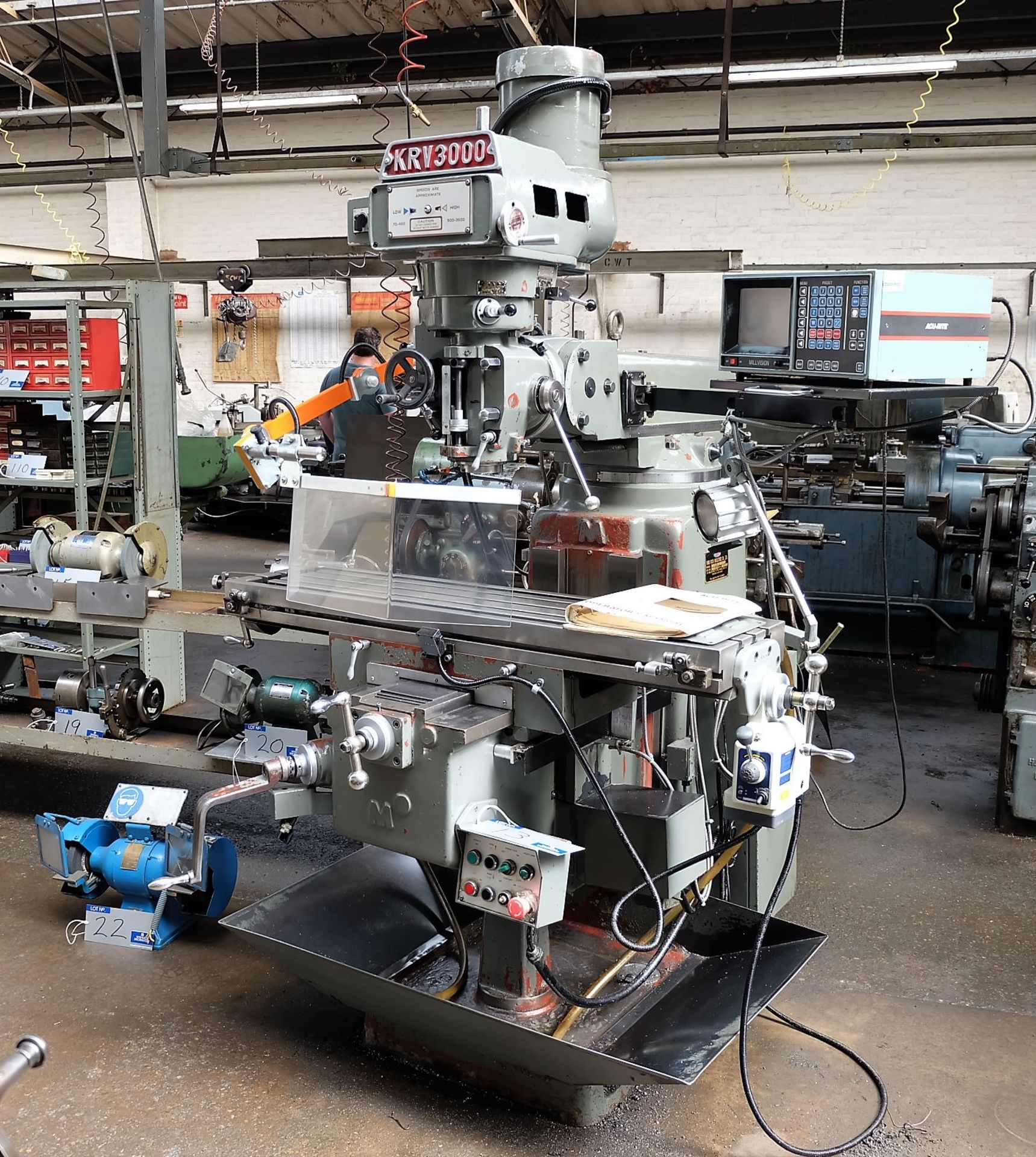 An XYZ KRV3000 Vertical Turret Head Milling Machine No.6056, 48in x 12in table with Acu-Rite